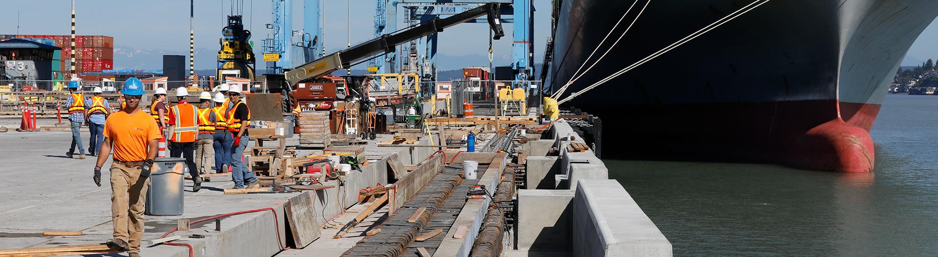 photo of people working on a marine terminal